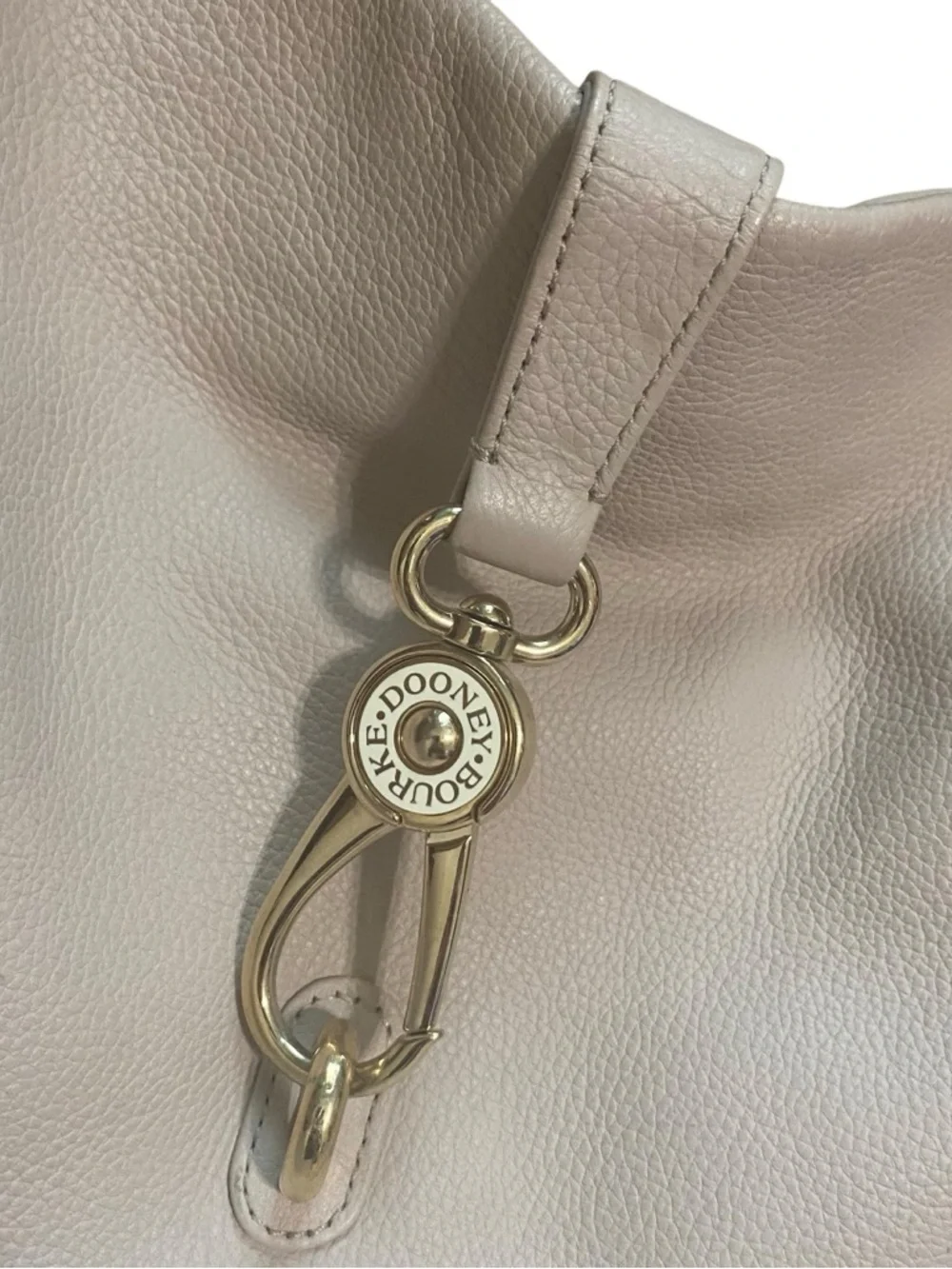Dooney & Bourke Bone Beige Pebbled Leather Reversible Lock Hobo Shoulder Bag